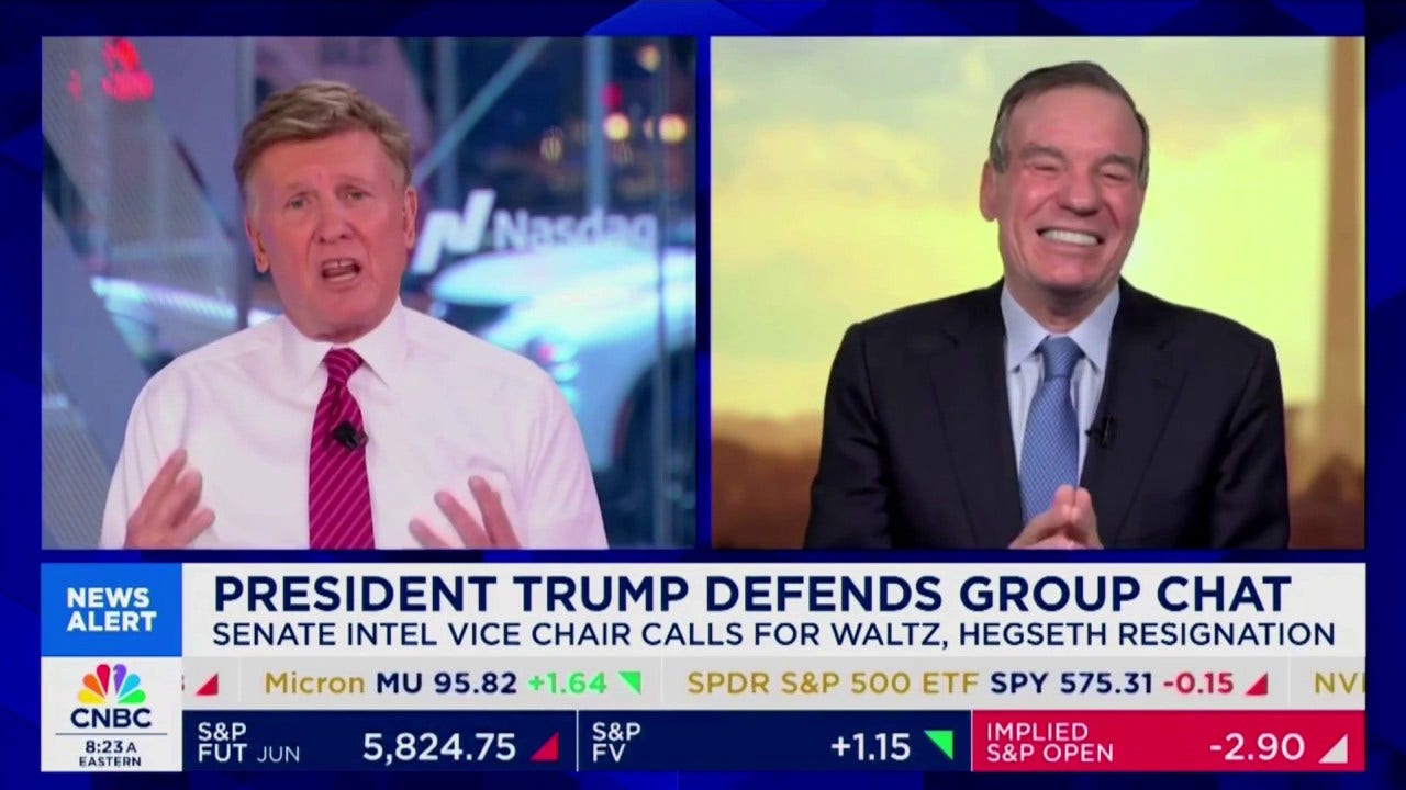 Sen. Mark Warner laughs at Biden Afghan comparison to Signal chat leak