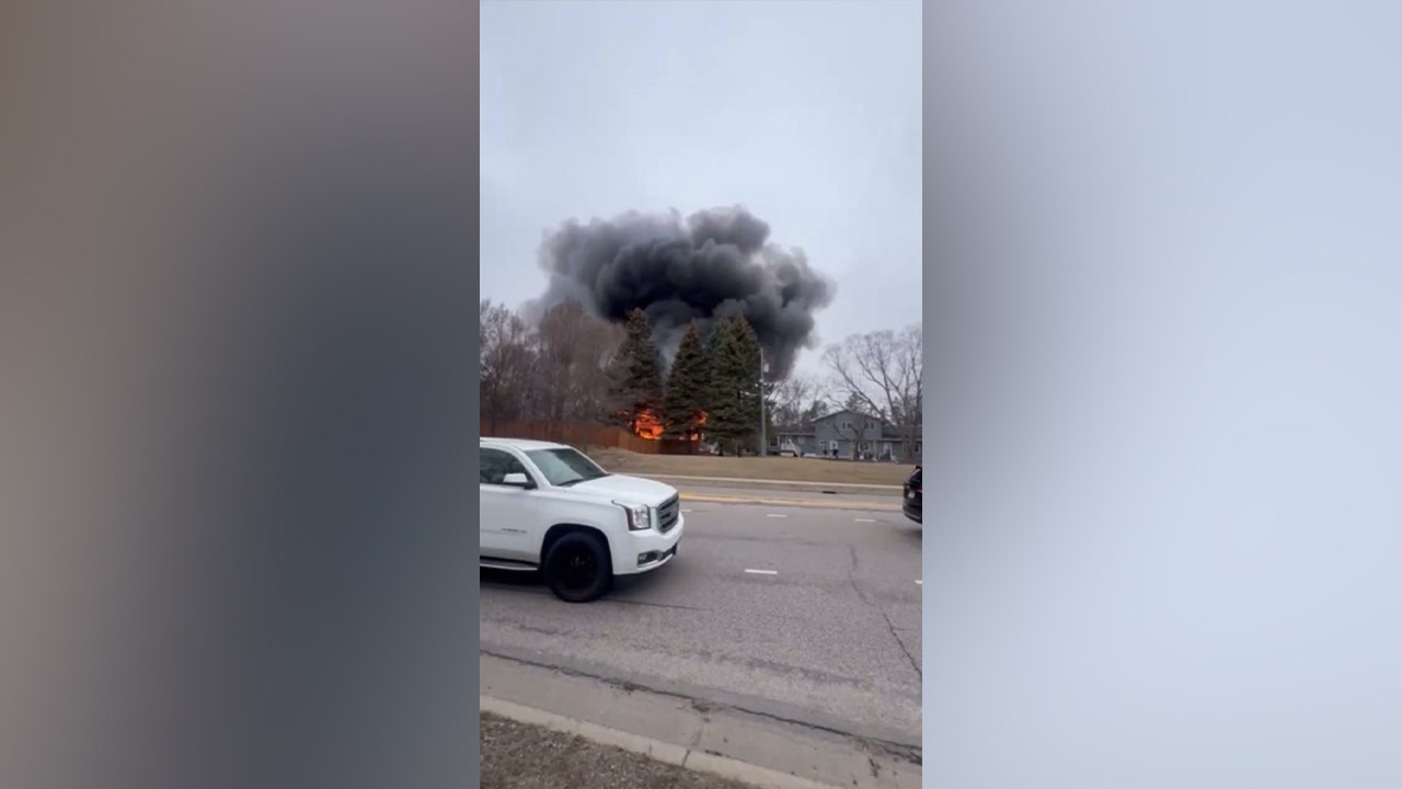Home engulfed in flames near Minneapolis after small plane crashes into residence