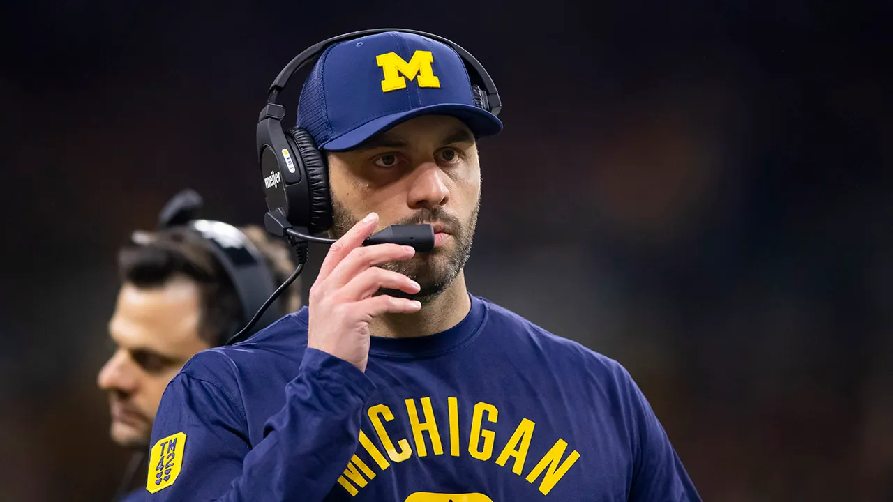 Michigan football: Former coach pleads not guilty to computer crimes