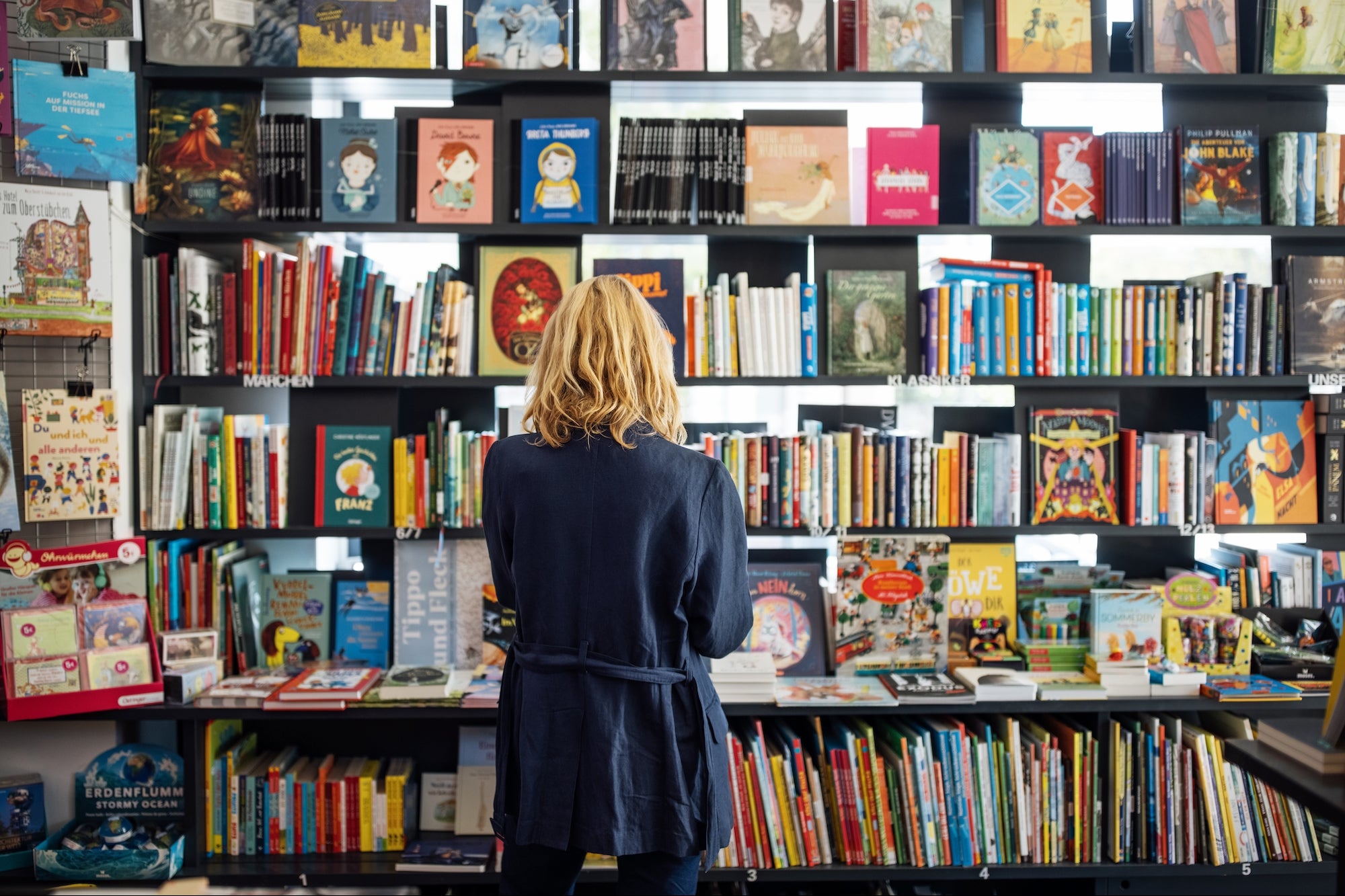 Community ‘Book Brigade’ Helps Small Business Move Locations