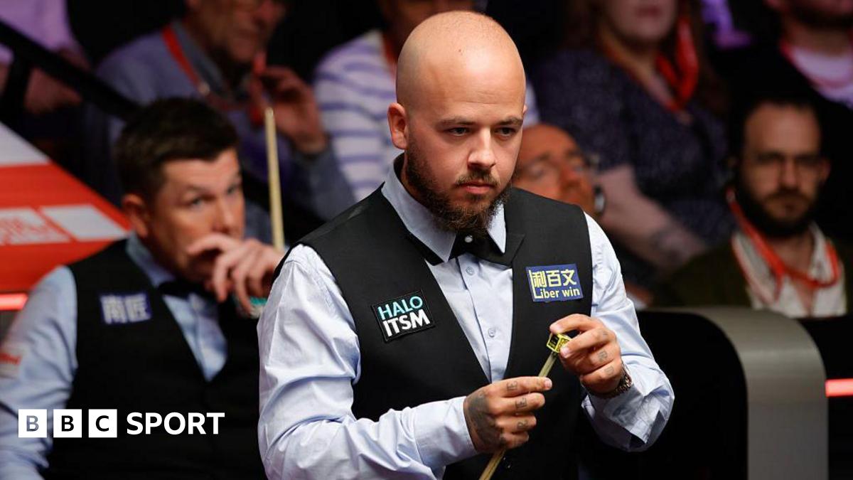 World Snooker Championship: Luca Brecel fights back to beat Ryan Day in first round
