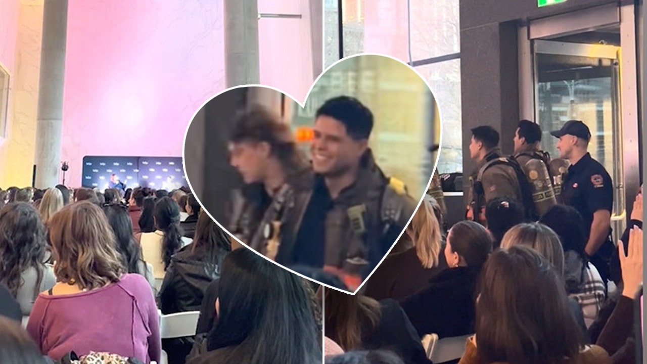 Surprise guests interrupt romance novel fan event and the crowd went wild