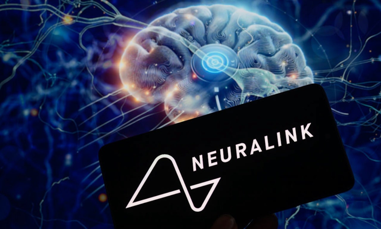 Paralyzed father with ALS receives Neuralink implant to control his computer