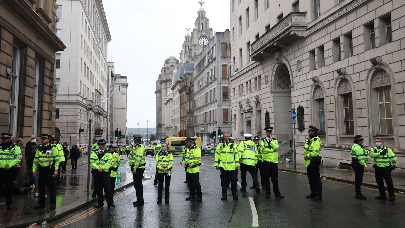 Liverpool parade: Police detain man after car collides into crowd