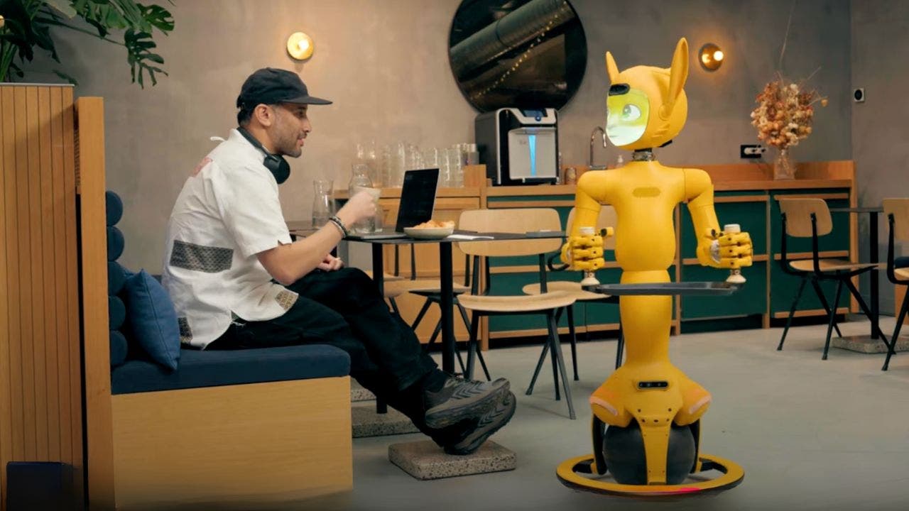 Robot with animated face designed to make customer service better