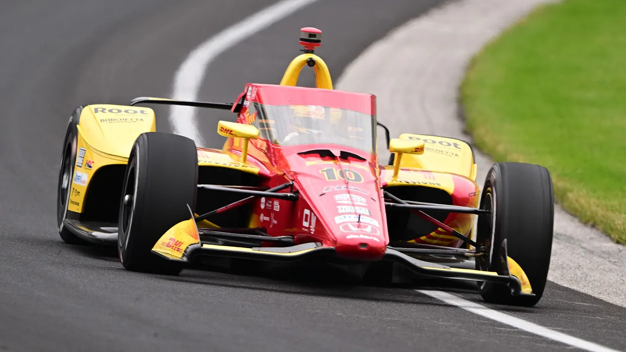 Alex Palou moves around Marcus Ericsson to win Indy 500