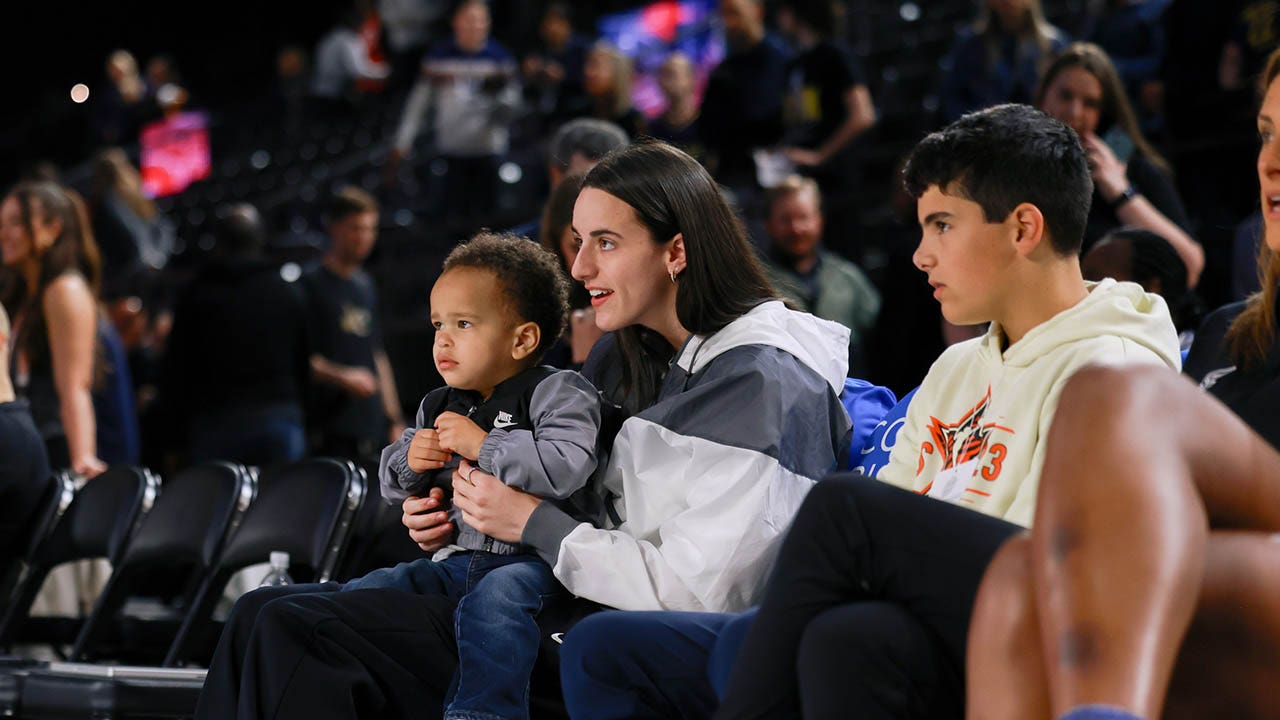 Sidelined WNBA star Caitlin Clark spotted carrying toddler through arena