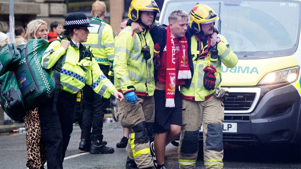 Minivan plows into Liverpool soccer celebration crowd, 53-year-old man detained