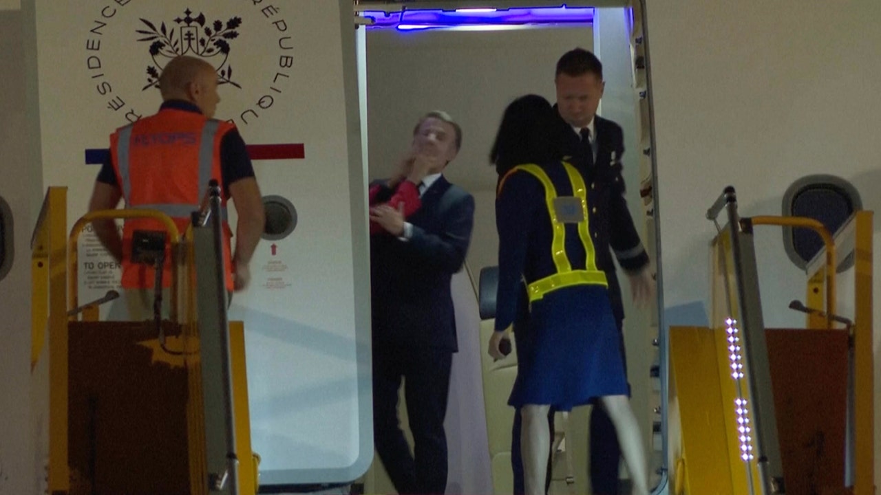 France’s Macron shoved in face by wife, Brigitte, during Hanoi, Vietnam arrival