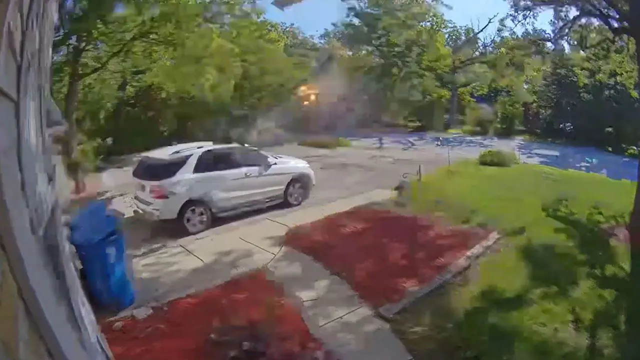 Truck explosion in suburban Chicago neighborhood damages homes, injures driver