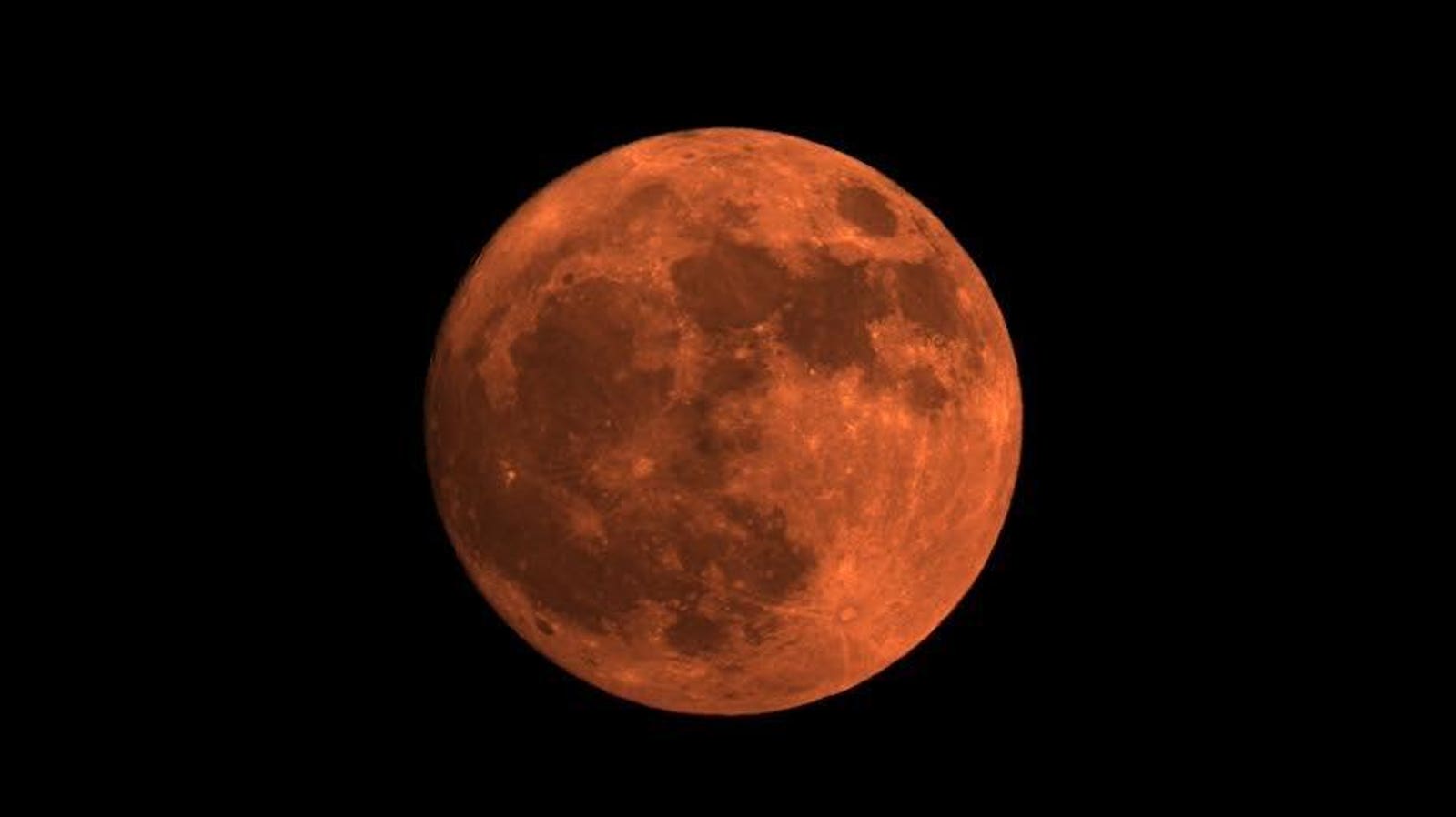 Strawberry Moon Skims Horizon In Once-In-A-Generation Event