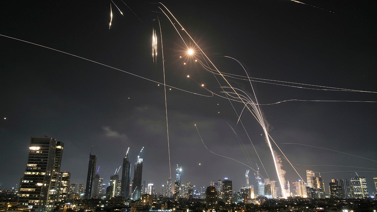 Iran fires 100 missiles at Israel in retaliation, few penetrate defense shield