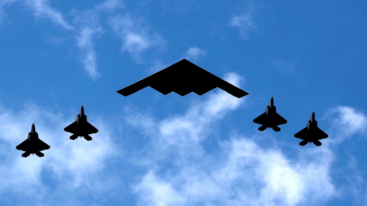 B-2 stealth bombers possibly carrying bunker-busters appear to head toward Guam