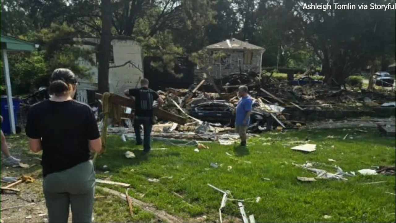 Powerful explosion in Kansas City suburb kills one person and dog, damages homes