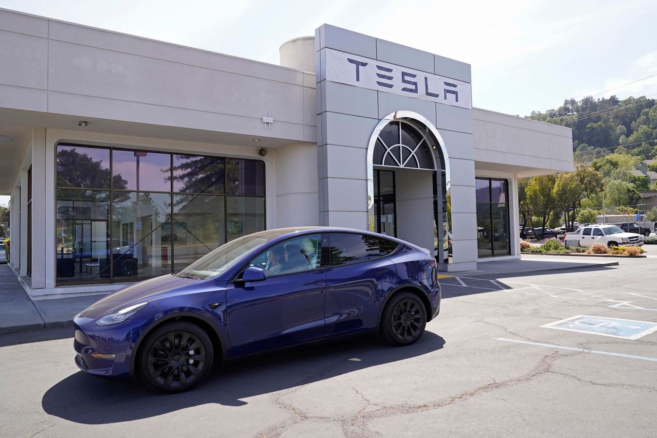 How Did Tesla Self-Deliver A New Car When Its Robotaxi Needs A Human?
