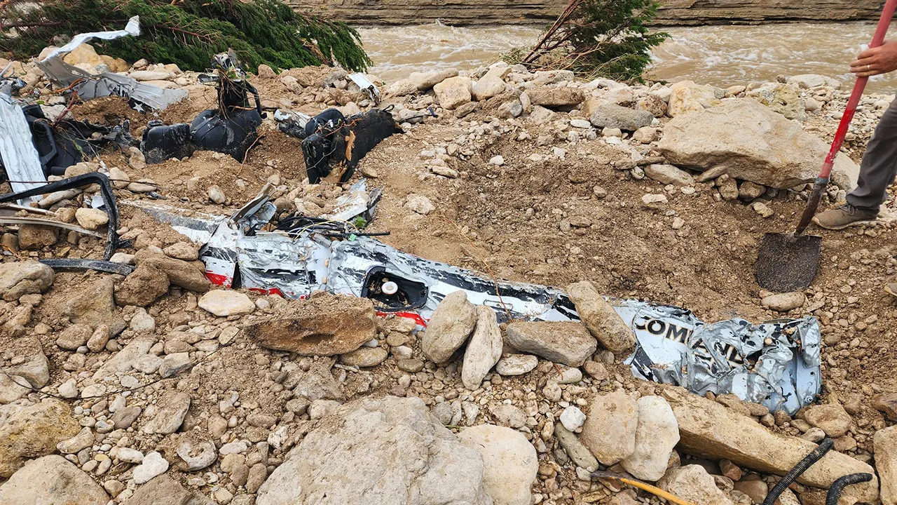 Harrowing pics show volunteer fire chief’s vehicle after he was swept away in floods