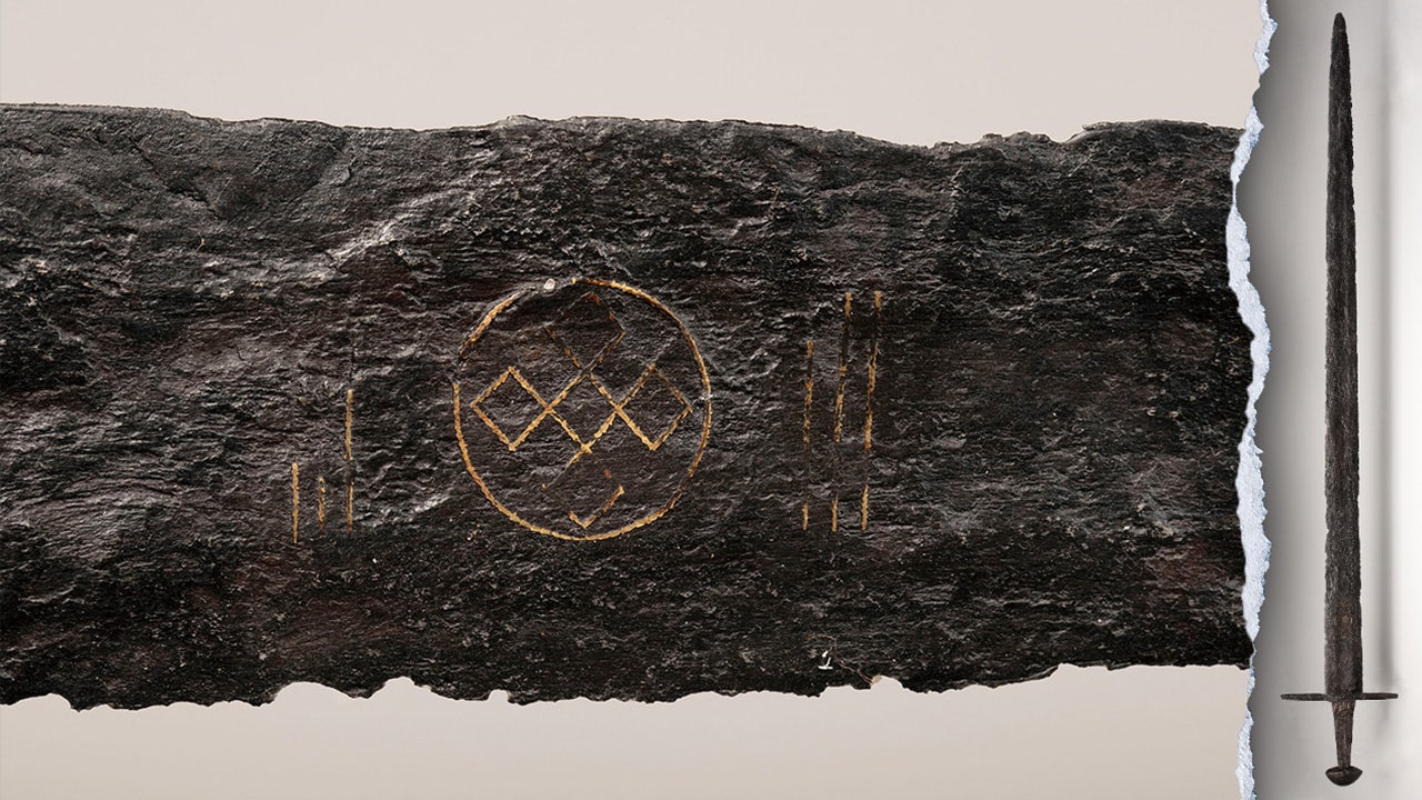 Medieval sword with rare symbols discovered by Dutch workers on display