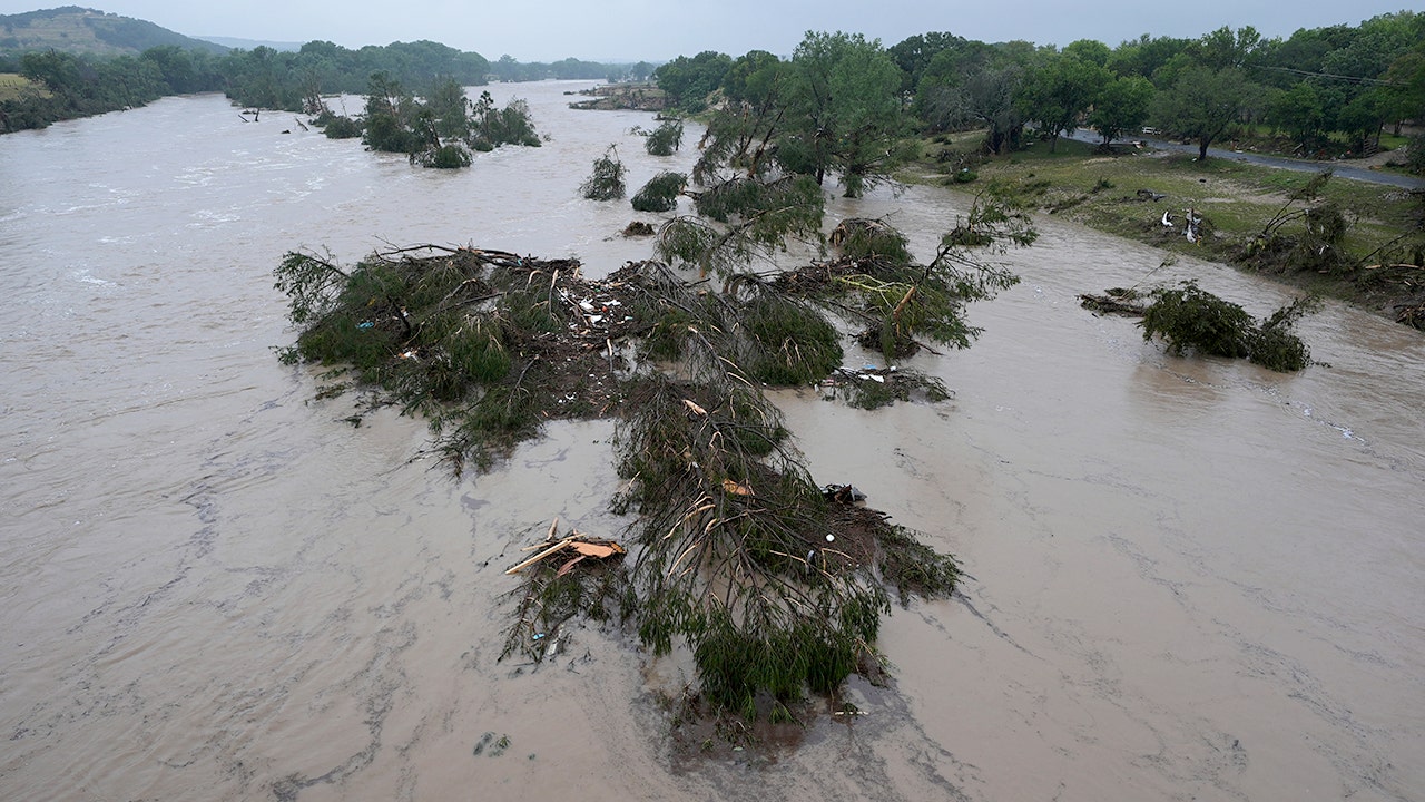 Texas family helps rescue woman clinging to tree for hours in deadly flooding