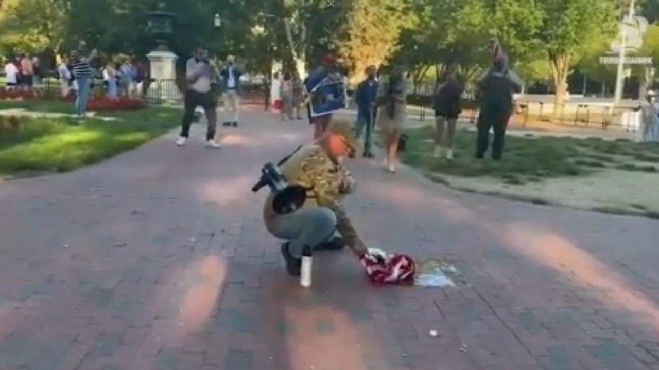 Veteran burns American flag outside White House as Trump signs flag order