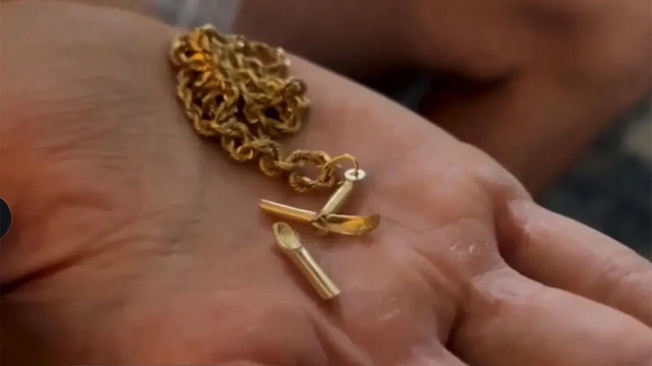 Florida man survives stray gunshot after his cross necklace deflects bullet