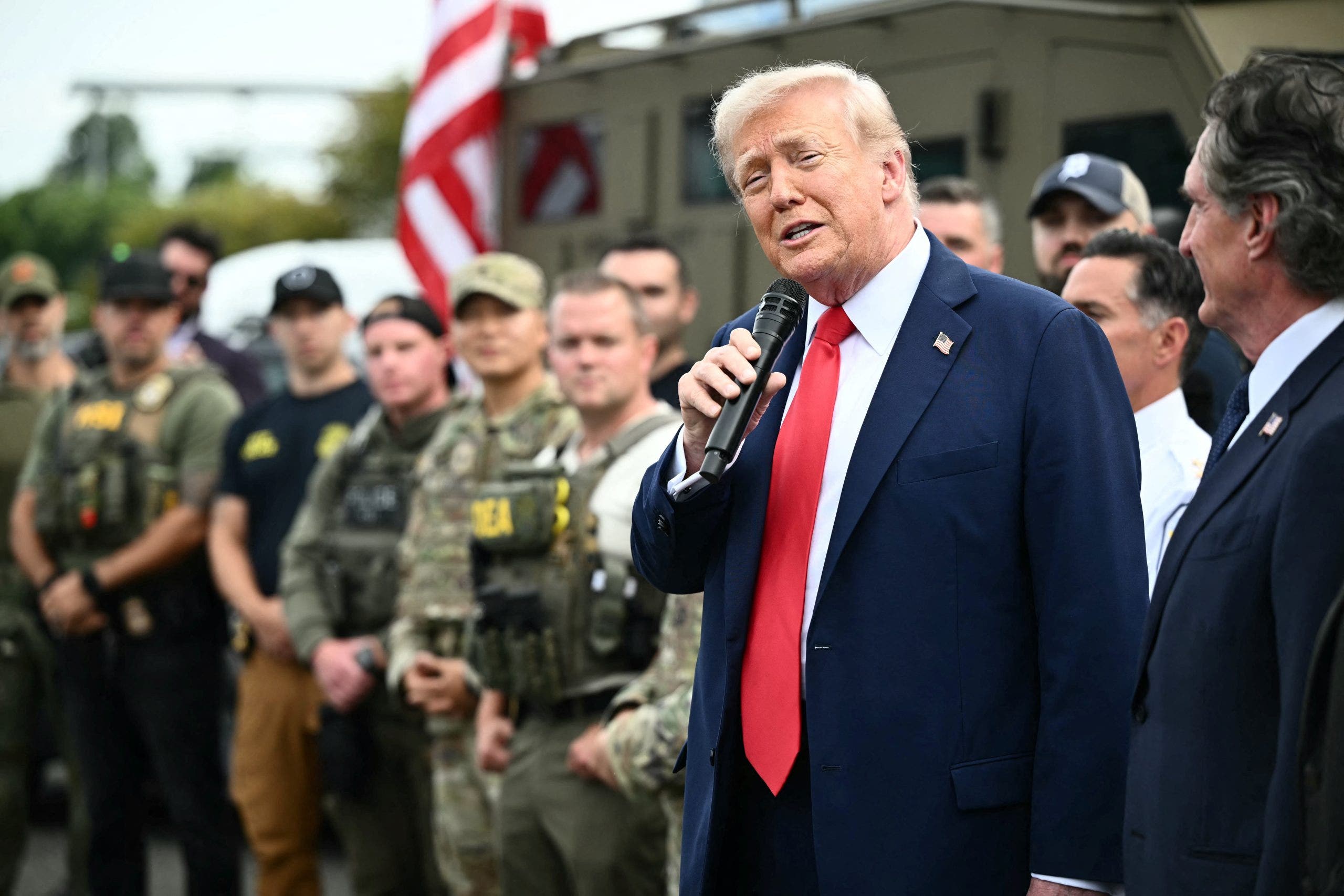 President Trump joins police and National Guard in Washington