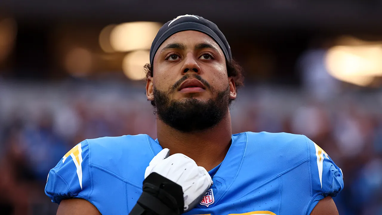 Rashawn Slater sustained a season-ending injury days after landing record deal
