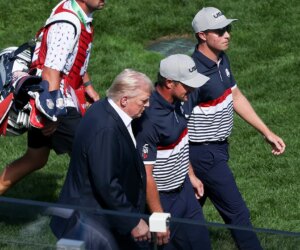 Trump shakes hands with Bryson DeChambeau at Ryder Cup