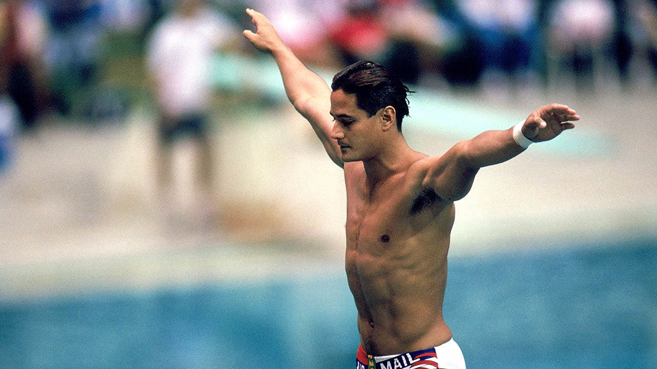 Olympic diving legend Greg Louganis sells medals to help with move to Panama