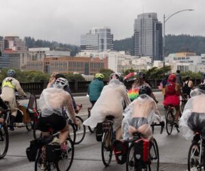 In Portland, nude cyclists join anti-ICE protests in rain-soaked ride