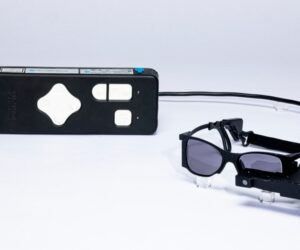 With a tiny eye implant and special glasses, some legally blind patients can read again