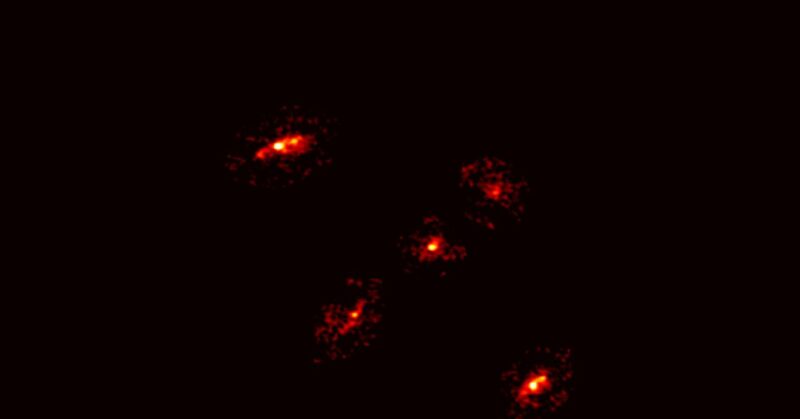 A Newly Discovered ‘Einstein’s Cross’ Reveals the Existence of a Giant Dark Matter Halo