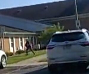 Bodycam shows police confront Michigan church attacker