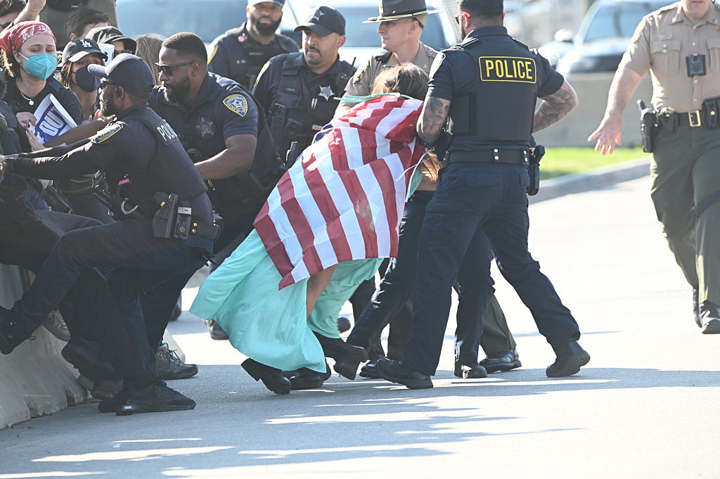 Trump Administration Accused of ‘Propaganda’ for Shifting Story in Shooting of U.S. Citizen Amid ICE Protests