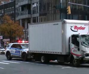 NYC truck hits parked van, pushing it onto sidewalk and injuring 9