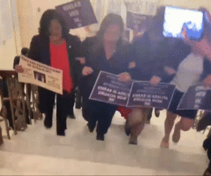 Democrats storm Johnson’s office demanding to swear in new representative