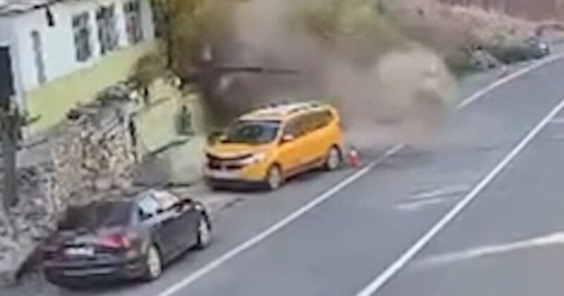 Man narrowly escapes giant boulder during landslide