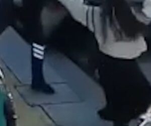 Security guard rescues woman from path of oncoming tram