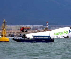 2 killed after cargo plane in Hong Kong veers off runway