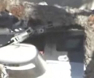 Helicopter crashes into California building
