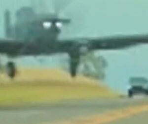 Dashcam video shows plane fly low on road
