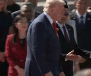 Trump dances with performers from Malaysia during Asia tour greeting