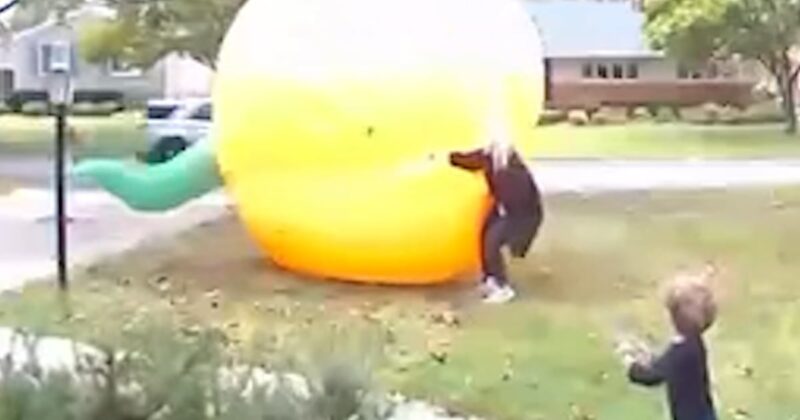 Mom scrambles to control giant inflatable pumpkin