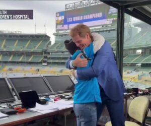 Boy reunites with football hero after heart transplant