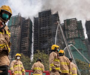 94 dead and dozens still missing in Hong Kong high-rise inferno