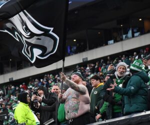 Elementary school Eagles fans hit Cowboys player posters in viral video