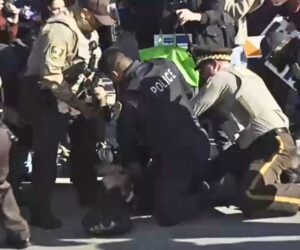 Anti-ICE protesters clash with police outside Chicago immigration facility