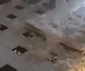 Suspect crashes through ceiling onto waiting SWAT team