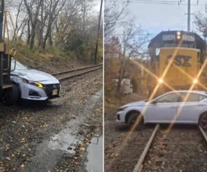 Woman survives train hitting car, pushing it a quarter-mile on New Jersey tracks