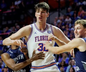 College basketball: World’s tallest teenager Olivier Rioux makes Florida debut