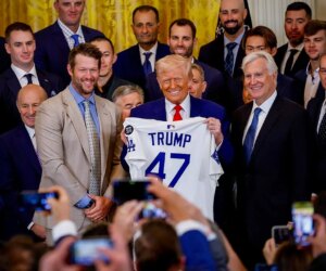 Dodgers urged to skip White House visit by immigration group